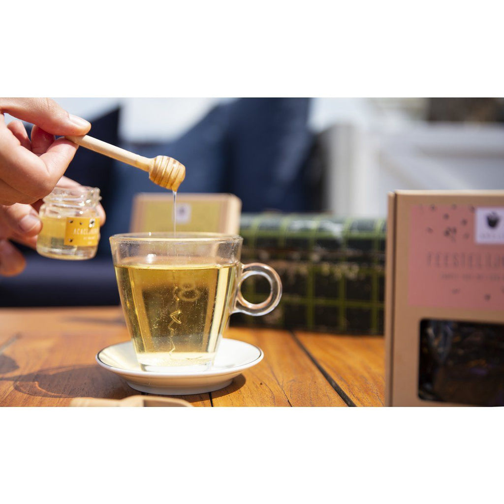 Honingpotje met lepeltje